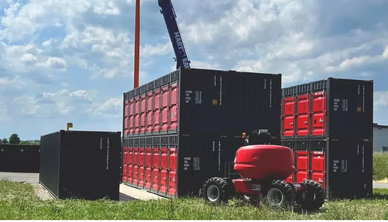 FOREMOST's stackable self storage shipping containers being assembled on-site.