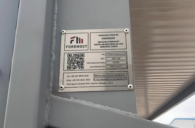 Manufacturing details of FOREMOST's eco-friendly grandstand construction on a product information plate with QR code.